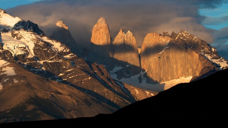 Sunrise lights up Torres del Paine. Photo credit David R. Beebe.