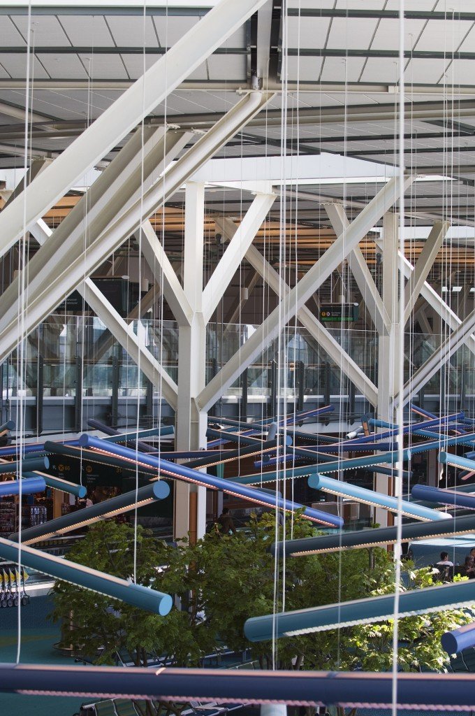 The linear lighting in the International Terminal depicts the log jams once ever present on the Fraser River. Photo by Vancouver Airport Authority