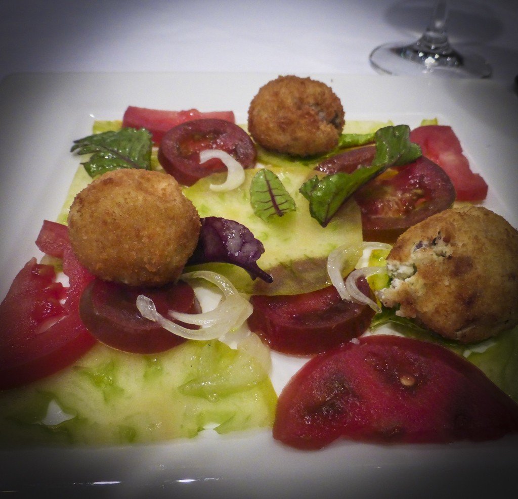 Tomato Carpaccio with ricotta cheese croquette, prosciutto and marjoram pesto (Photo by Sandra Chambers)