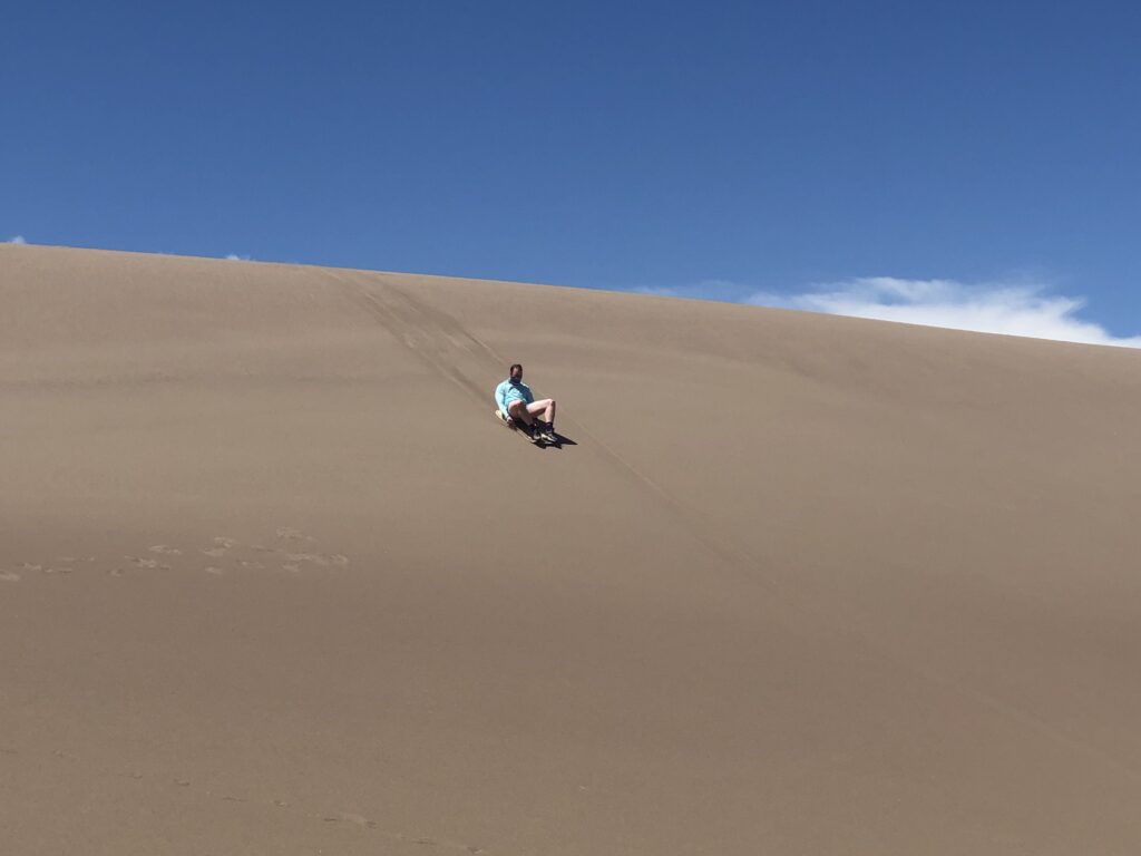 Sliding down the dunes