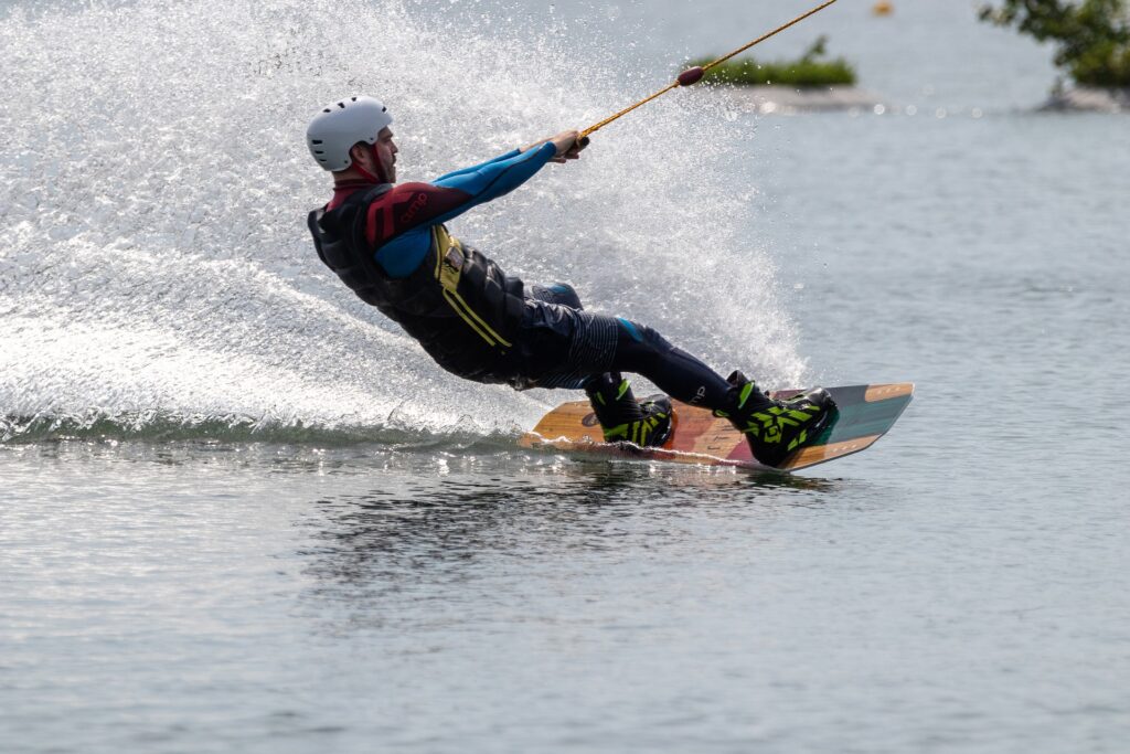 Guy wakeboarding on a lake