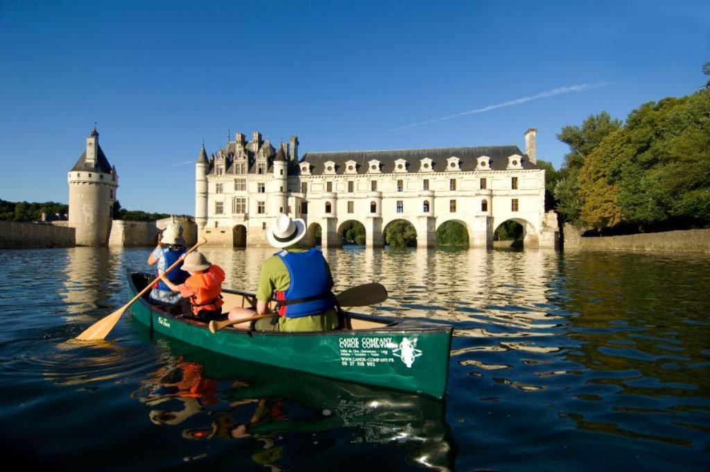 Canoeing along the Cher River is another unique way travelers can see the château