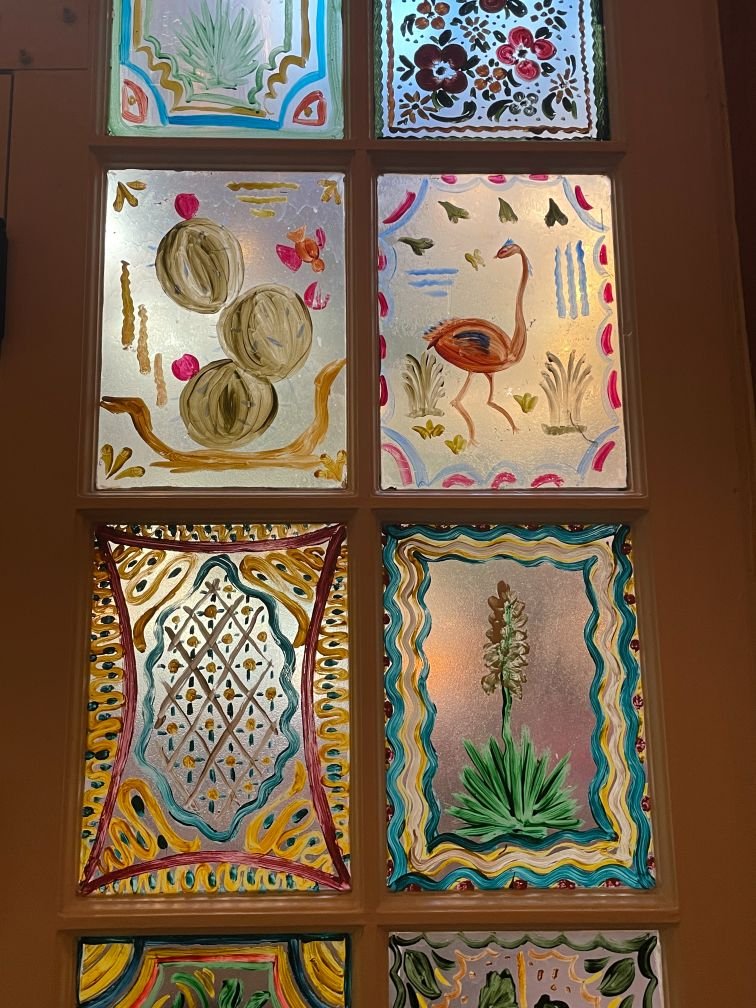 Hand painted windows by Ernest Martinez