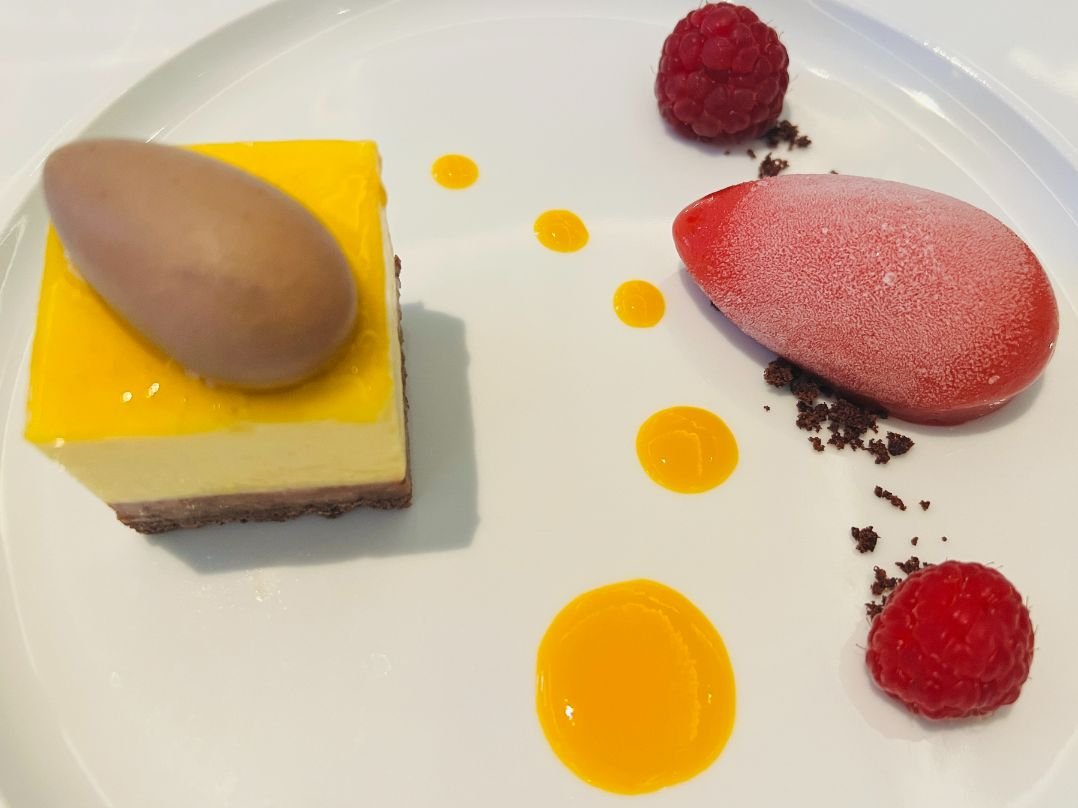 Diet’s not allowed: Polo Grill’s mango cheesecake and raspberry sorbet. 