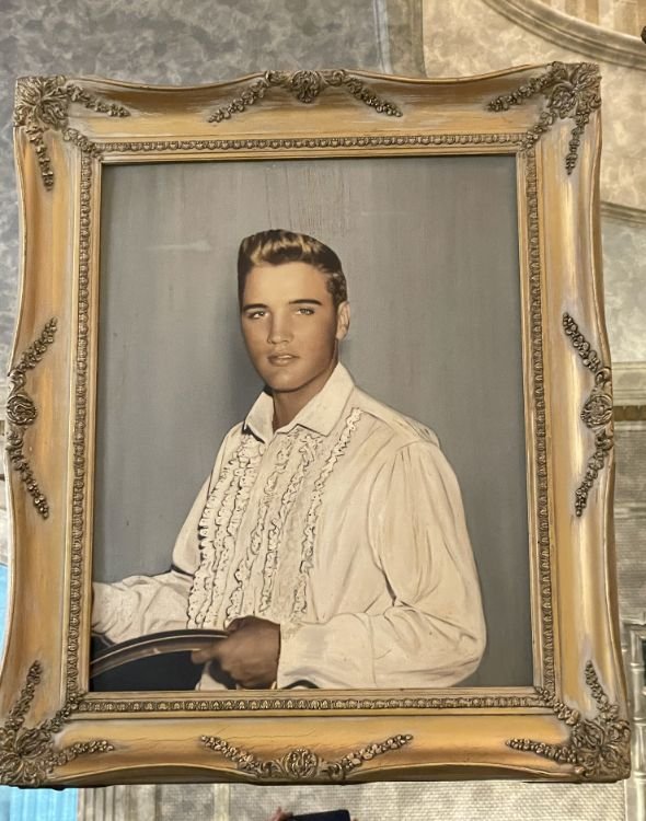 Photos of Elvis dot the walls at Graceland
