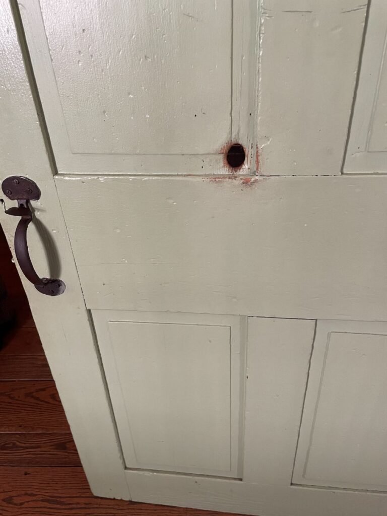Bullet hole that went through two doors and struck Jennie Wade