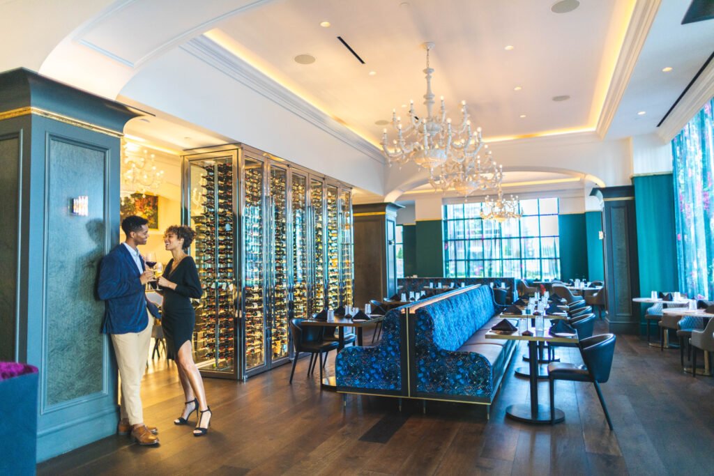 The open kitchen at Mico is flanked by an extensive wine cellar. Image courtesy Kessler Collection.