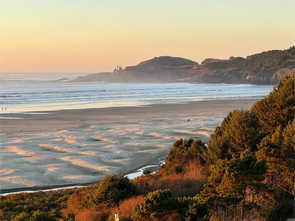 The sun begins to set on Agate Beach