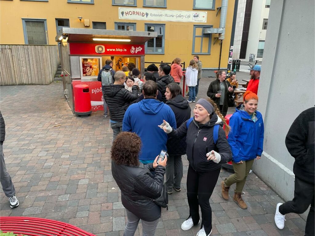 Lively Tour guide Explaining the Hot Dog Stand Fame