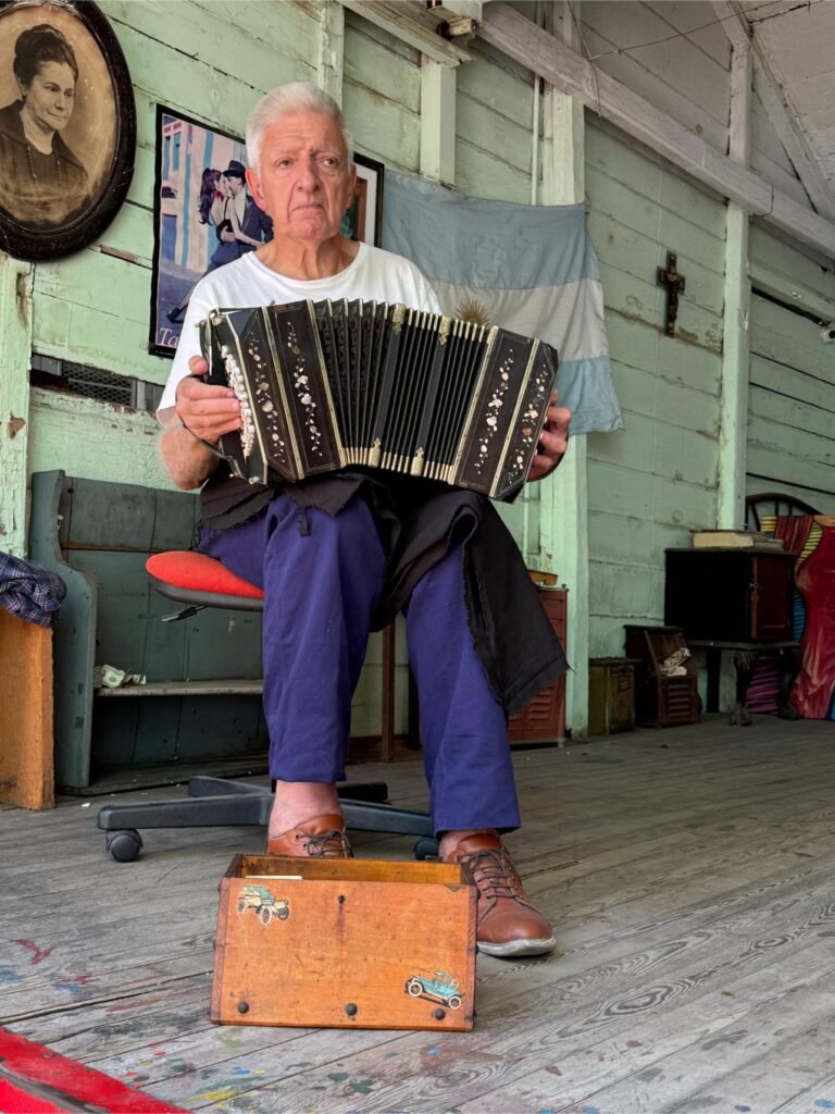 A musician entertains, photo by Debbie Stone