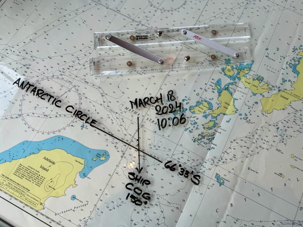 The map shows the coordinates of where we crossed the Antarctic Cricle. Photo by Jett Britnell