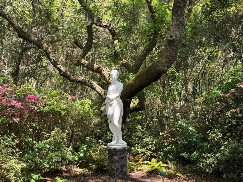 Statuary and flora abound at the Elizabethan Gardens. Photo by Debbie Stone