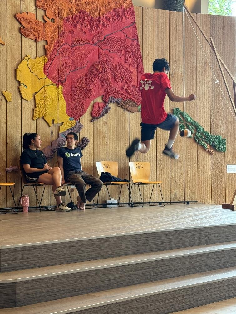 Demonstration of a game at Native Alaska Heritage Center. Photo by Debbie Stone