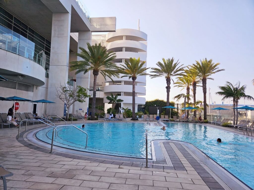 View of Hilton San Diego Bayfront with large pool in front 