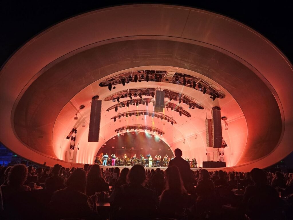 The Rady Shell in San Diego bathed in orange-like color at night