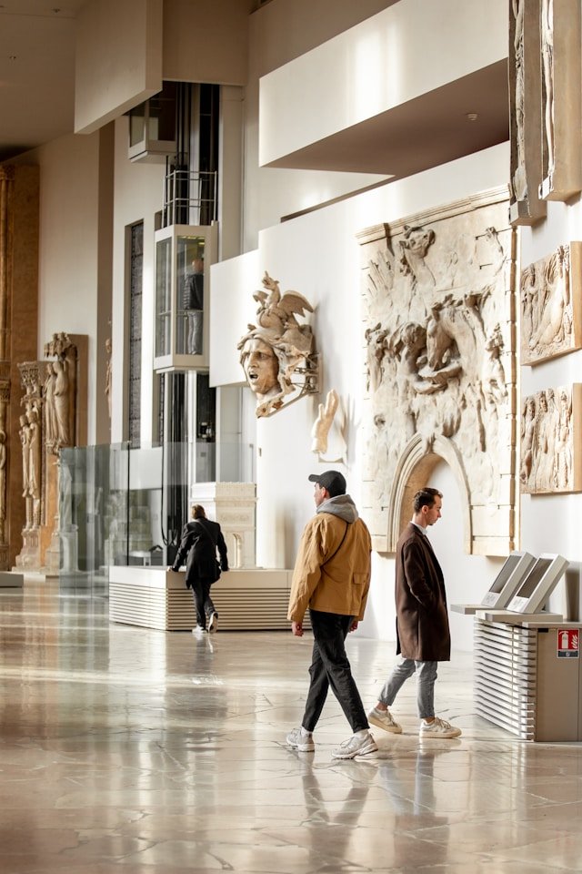 couple walking through museum Europe