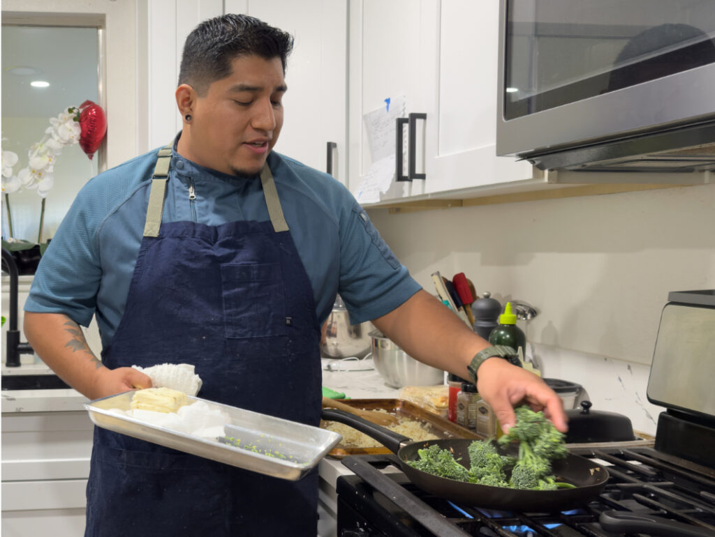 Chef Jonathan cooking broccolini