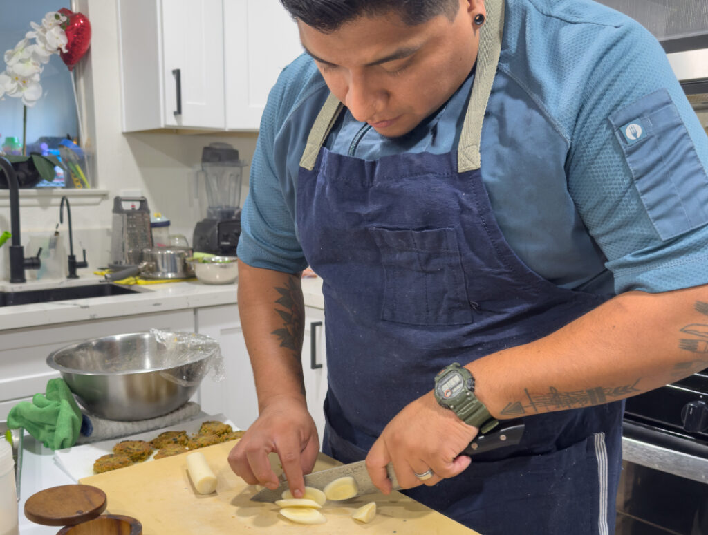 Chef Jonathan slicing Hearts of Palm