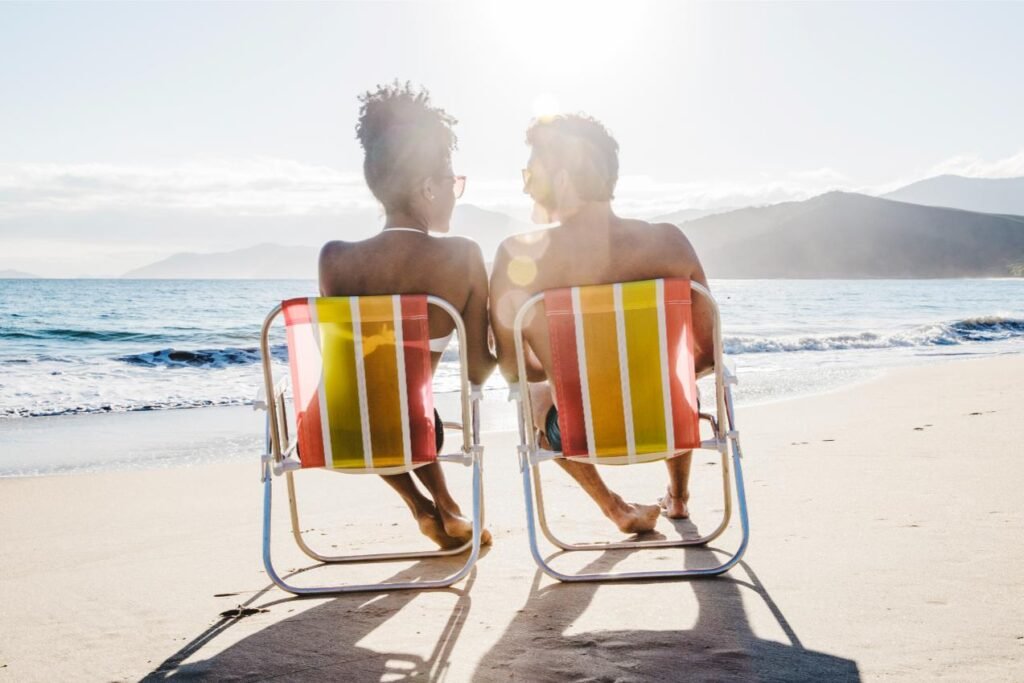 St Barts couple sitting on beatch