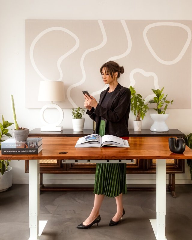 woman at sit stand desk