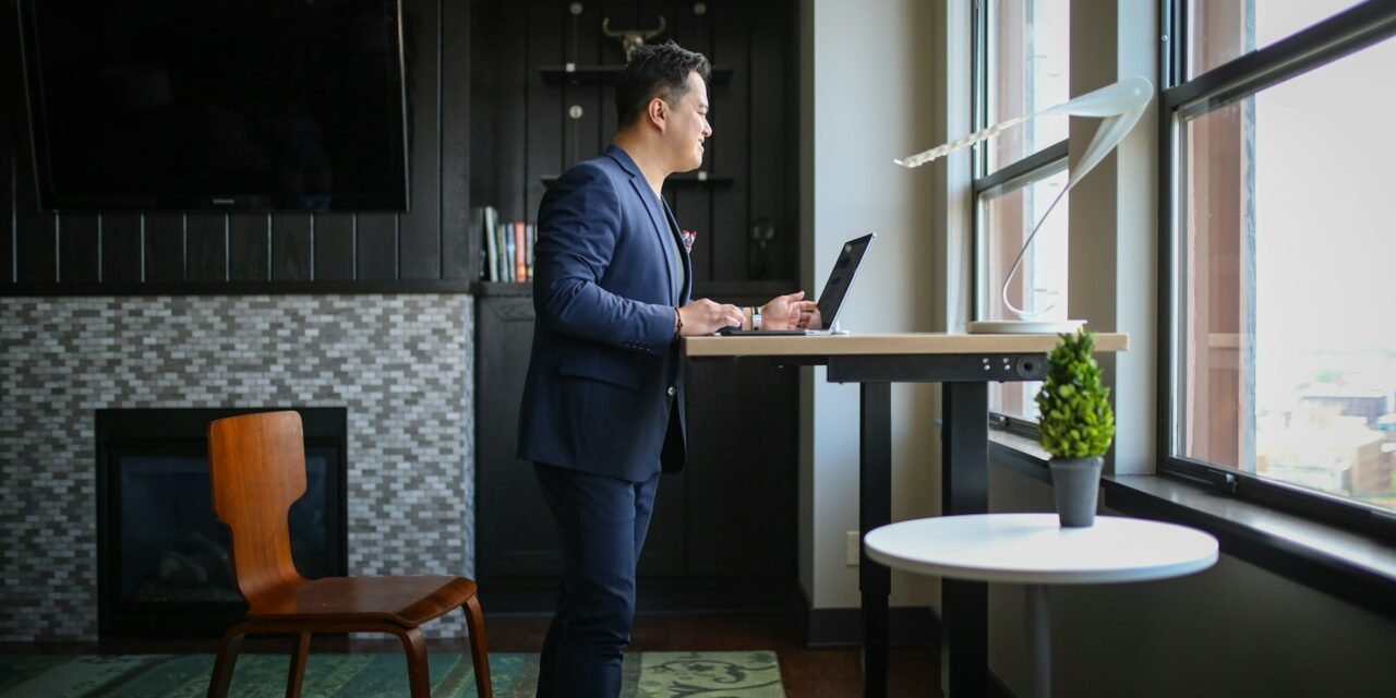 Why Investing in a Sit Stand Desk in Australia Can Improve Your Health and Productivity