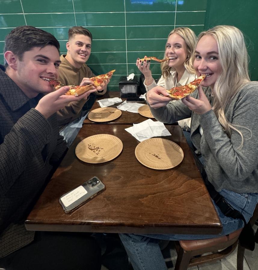 Chowing down at Bleecker Street Pizza. Photo by Debbie Stone